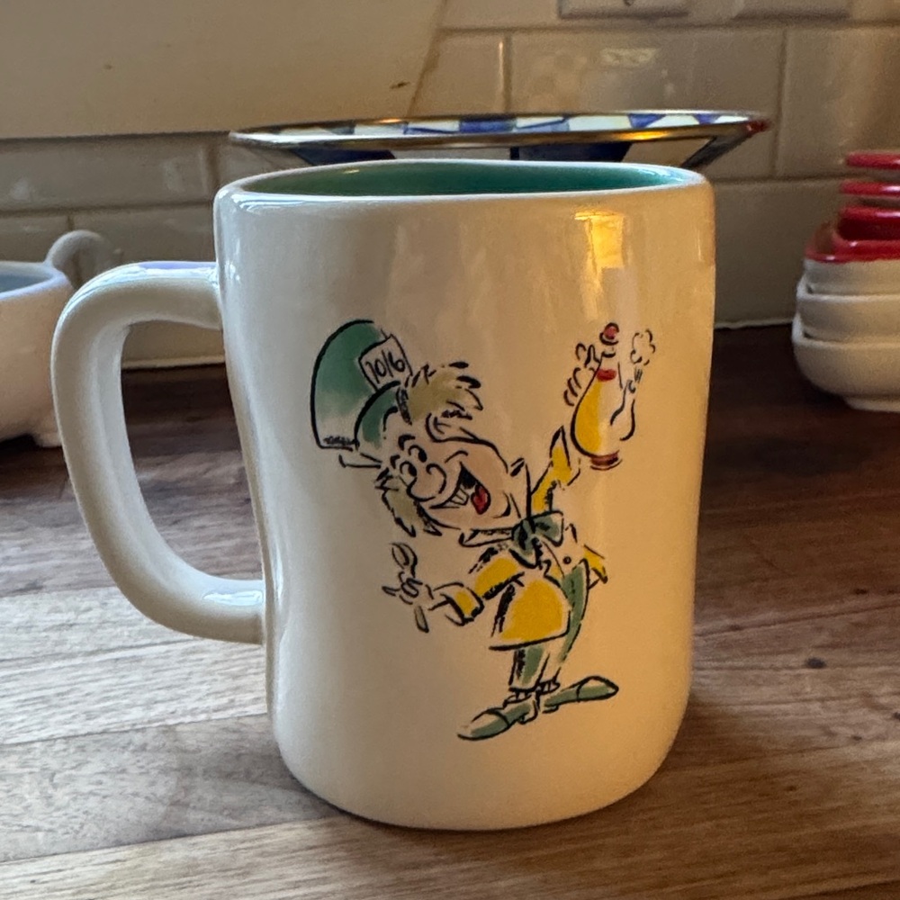 White Ceramic Mug with Mad Hatter Design